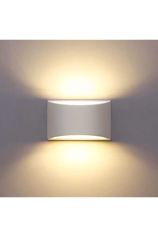 Apliques de pared modernos en yeso con luz LED cálida para decorar cualquier espacio.