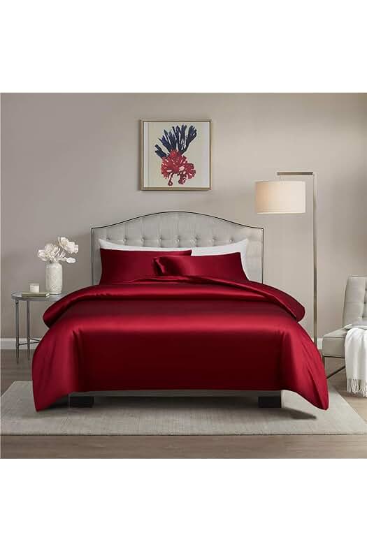Ropa de cama de satén rojo vino de lujo con funda de almohada a juego.
